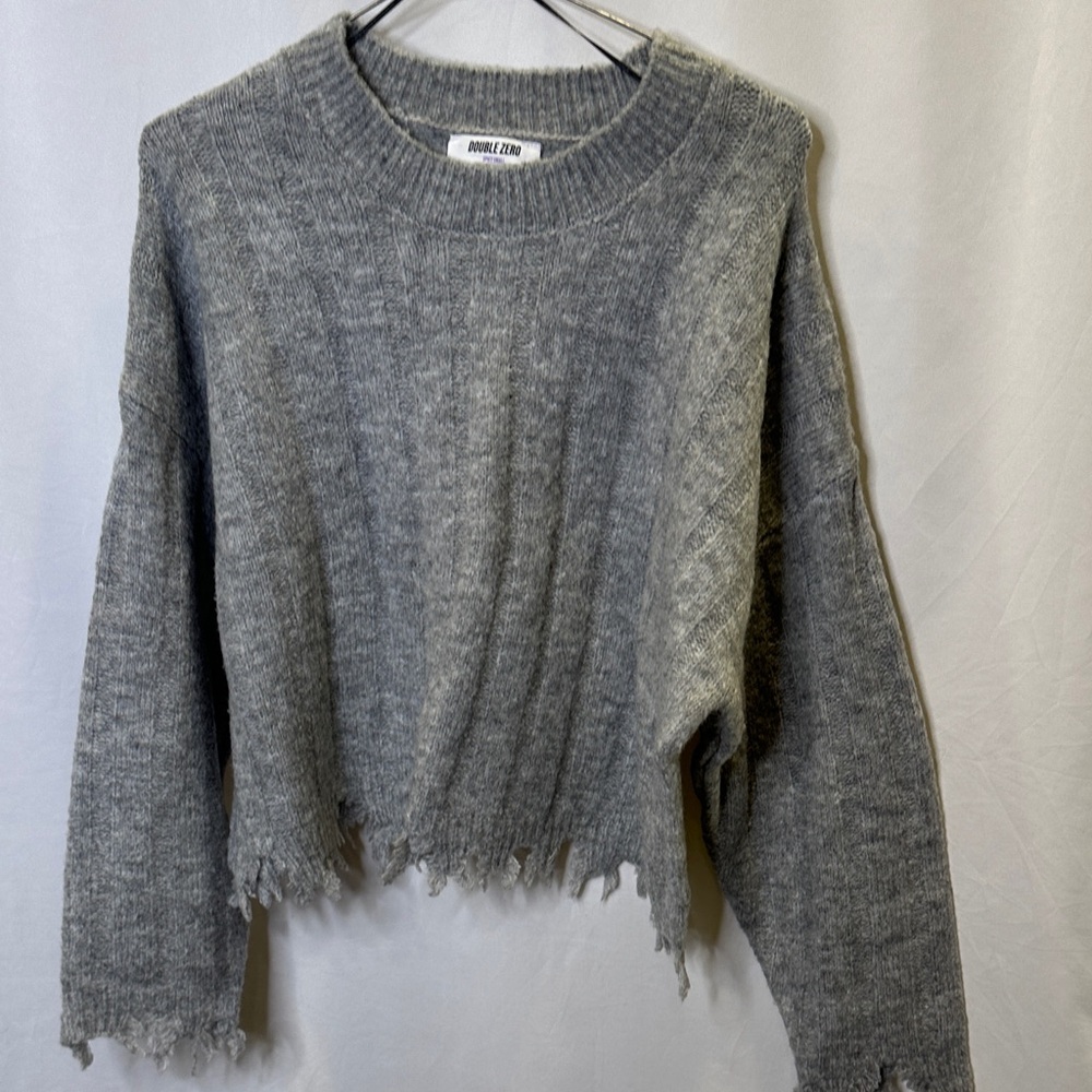 Double Zero crew neck sweater with ragged hem on body and sleeves.  Size small